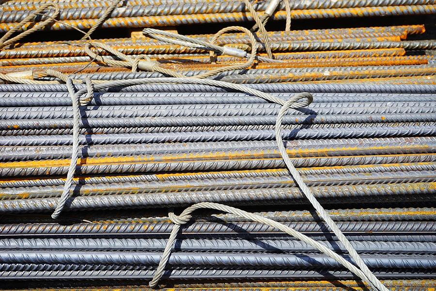Bundles of reinforcing steel tied and stacked on a site