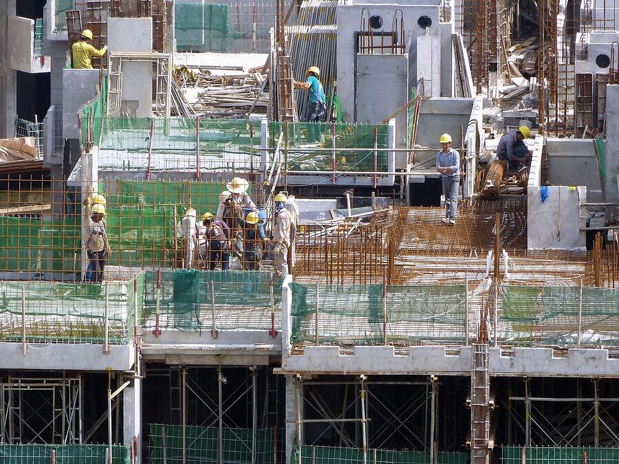 A scaffold deck and formwork on an upper floor
